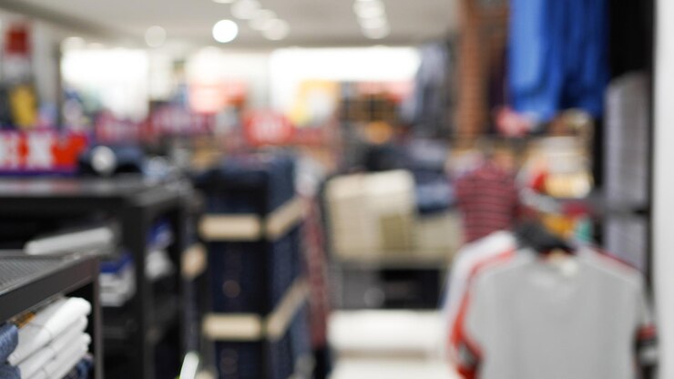 Sfocatura dello sfondo del centro commerciale e del negozio, negozio nel centro commerciale con sfondo chiaro bokeh