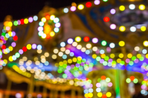 sfocatura di luce a sfondo del mercato notturno festival di carnevale