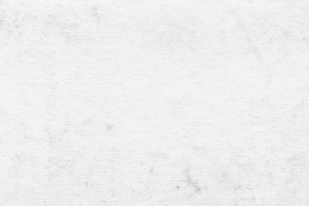 Sfondio di carta bianca d'epoca e d'aspetto vecchio con una consistenza grunge