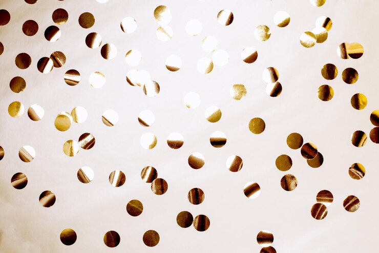 Foto sfondio festivo con confetti dorati concetto di nuovo anno luminoso