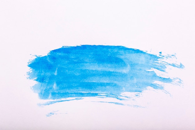 Sfondo acquerello. Pennellate blu di pittura ad acquerello su carta bianca. Foto di alta qualità
