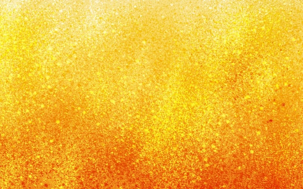 Sfondo arancione e giallo con una texture glitter oro.