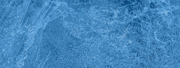 Sfondo astratto della struttura del ghiaccio nel classico colore blu 2020