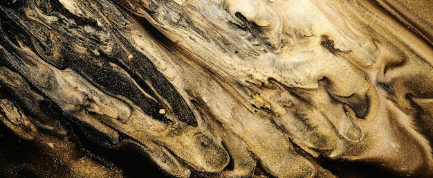 Sfondo astratto di lusso arte liquida Miscela di vernice oro nero macchie di inchiostro alcolico trama di marmo Motivo di stampa moderno