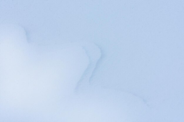 Sfondo astratto di Natale Trama di neve bianca lucida in una giornata di sole invernale