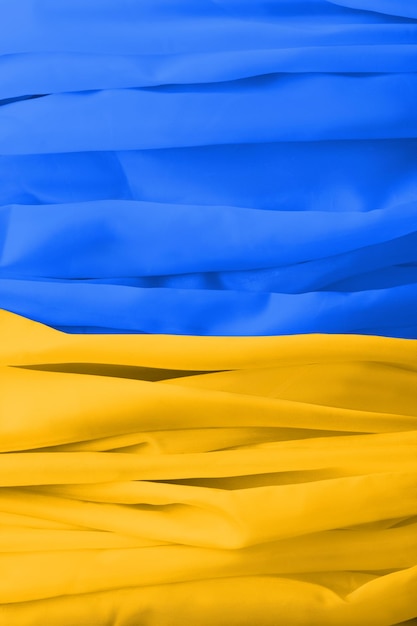 Sfondo astratto di seta giallo blu bandiera dell'Ucraina
