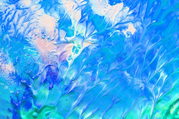 Sfondo astratto fluido blu verde modello onde del mare cosmico macchie di vernice arte liquida creativa Colori del pianeta terra