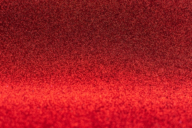 Sfondo astratto glitter rosso con sfocatura