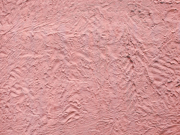 Sfondo astratto muro di stucco testurizzato rosa Materiale da parete in architettura e idea di decorazione d'interni