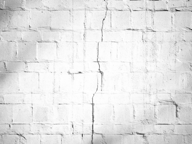 Sfondo bianco e nero facciata casa muro di cemento dipinto senza soluzione di continuità in pietra grigia texture vecchia superficie della parete