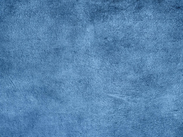 Sfondo blu. intonaco di texture grunge su un muro di cemento.
