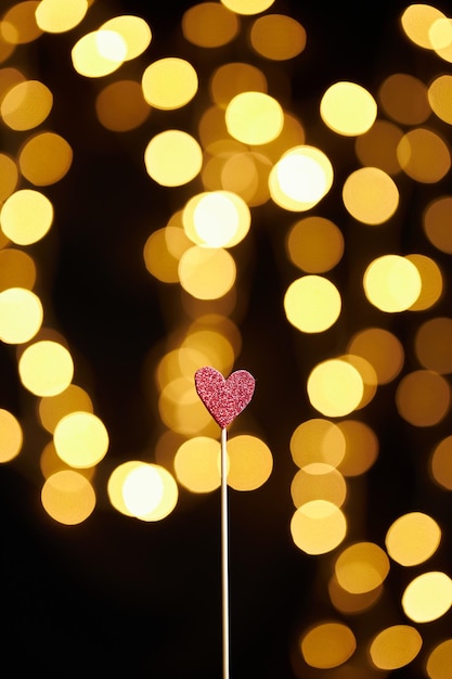 Sfondo bokeh di cuori decorativi lucidi San Valentino Capodanno umore Cartolina di Natale