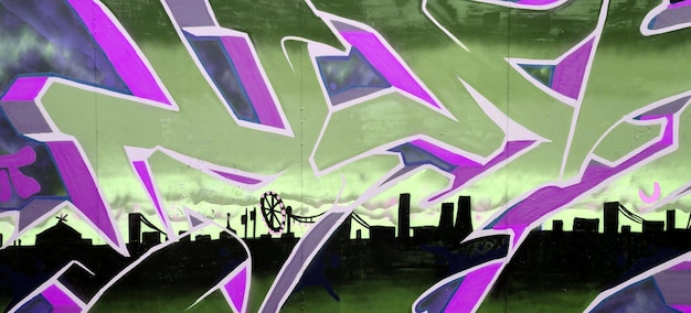 Sfondo colorato di graffiti che dipingono opere d'arte con strisce di aerosol luminose sulla parete metallica