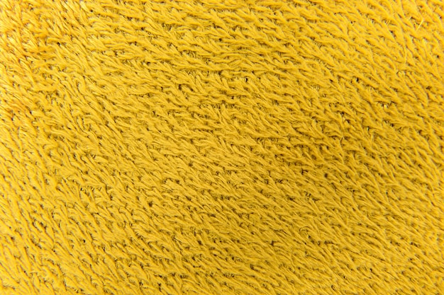 Sfondo da morbido tessuto di lana sintetica gialla