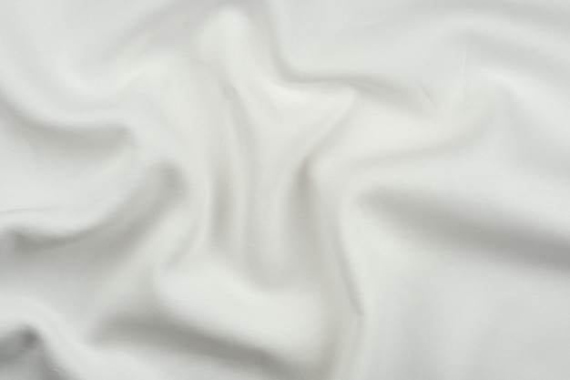 Sfondo da tessuto di cotone monocromatico bianco da vicino texture