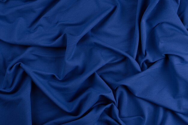 Sfondo da tessuto di cotone monocromatico blu close up texture