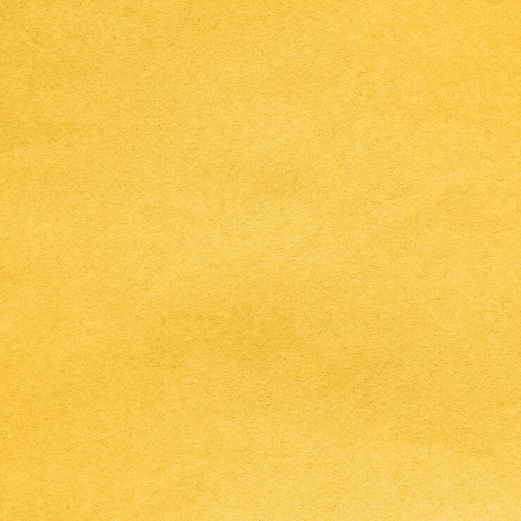 Sfondo da un foglio di cartone riciclato da colorare in tendenza Fortuna colore oro dell'anno 2021. Primo piano vista dettagliata trama astratta riciclato modello di materiale in cartone ecologico, sfondo per il design