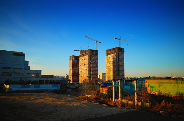 Sfondo del cantiere di tre edifici