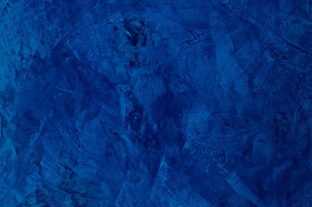 Sfondo della trama intonacata con effetto marmo color blu. sfondo artistico fatto a mano