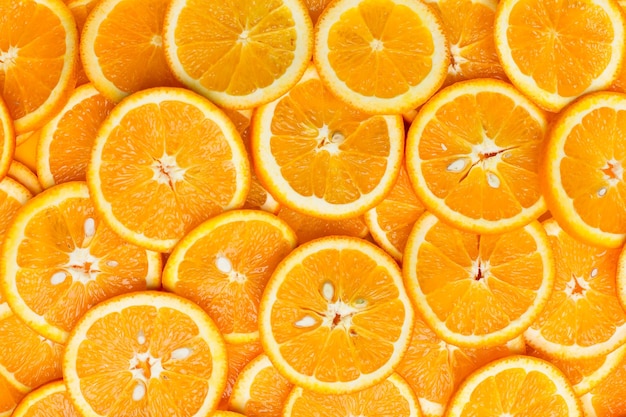 sfondo di arance a fette. sfondo arancione, vitamina C