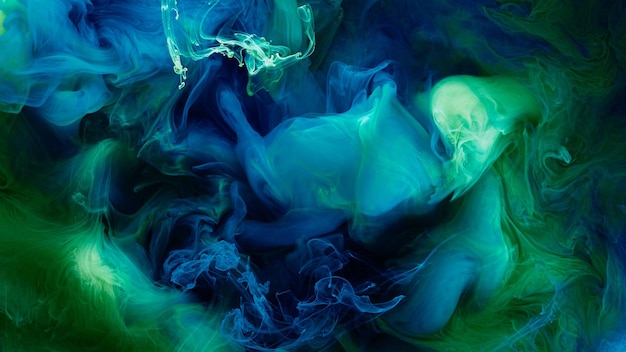 Sfondo di arte liquida a contrasto verde blu Esplosione di inchiostro vernice nuvole astratte di fumo mockup acquerello sott'acqua