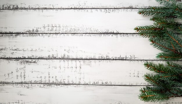 Sfondo di Capodanno e Natale con albero di Natale su sfondo bianco in legno Buon Natale