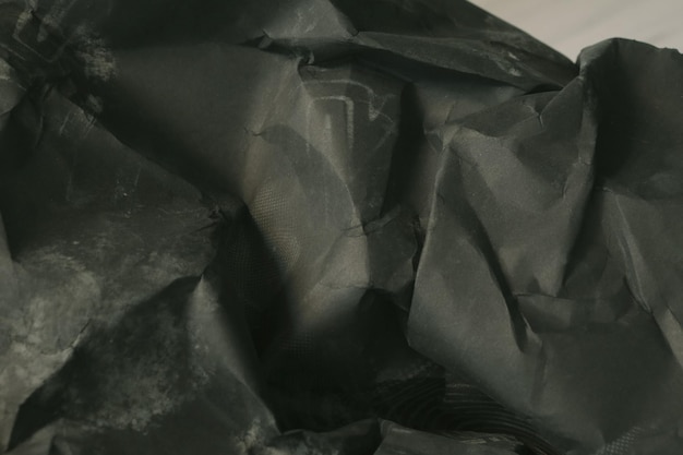 sfondo di carta stropicciata stropicciata nera grunge texture di sfondo