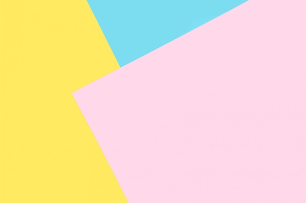 Sfondo di carte blu, rosa, gialle. Sfondo geometrico e minimale in colori pastello