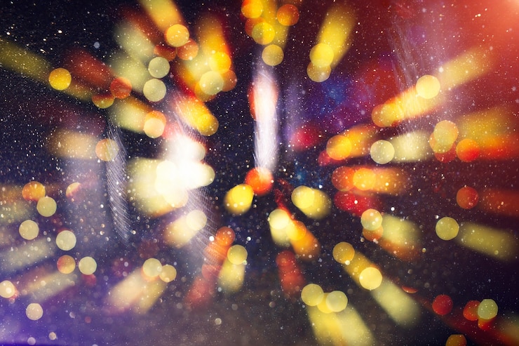 Foto sfondo di celebrazione con luci dorate sfocate per natale, capodanno, vacanze, feste