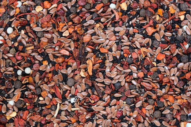 Sfondo di cibo di semi aromatici piccanti e amari pungenti, spezie culinarie, fotografia macro close-up