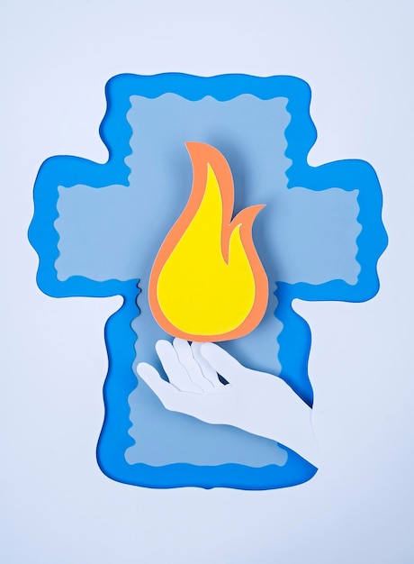Sfondo di composizione di carta per la mano di pentecoste che tiene la lingua di fiamma in una cornice a forma di croce