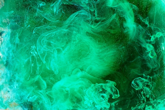 Sfondo di fumo chimico vorticoso liquido verde