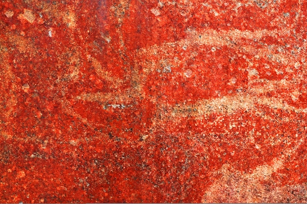 Sfondo di granito rosso. Modello per il design. una pietra naturale