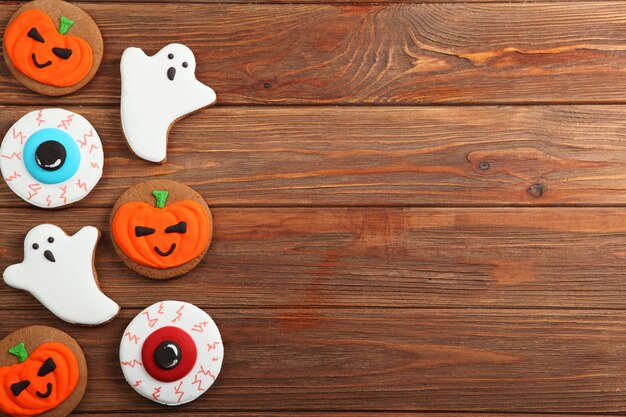 Sfondo di Halloween con pan di zenzero e altri dolci con posto per il testo