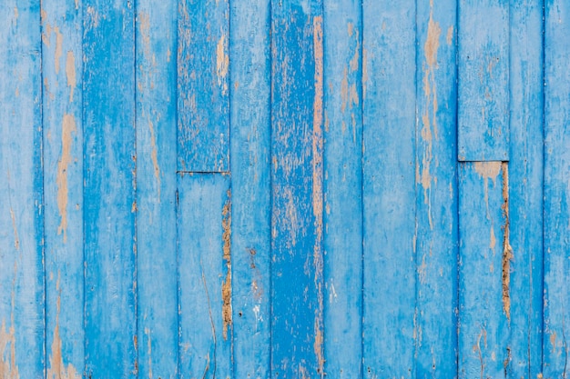 Sfondo di legno blu Bastoncini di legno Collegati per creare un muro privato per prevenire il pericolo