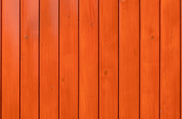 Sfondo di legno. Tavole verniciate arancio.