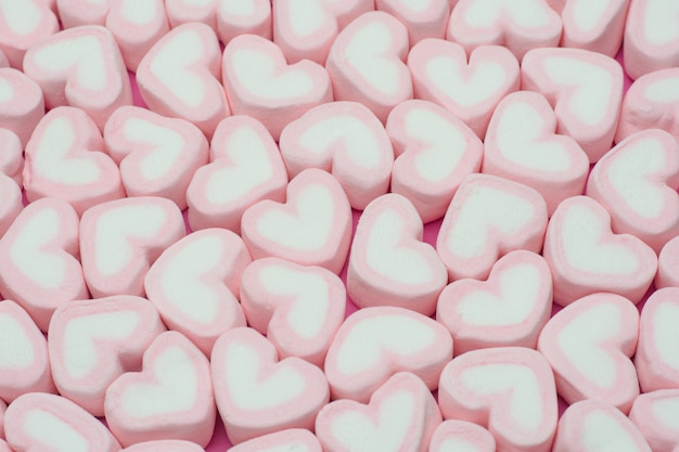 Sfondo di marshmallow a forma di cuore rosa