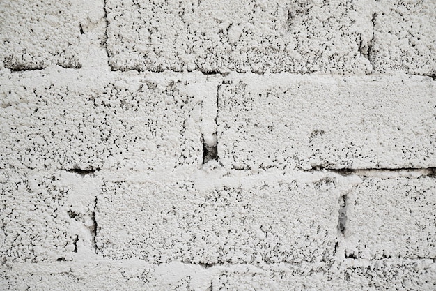 Sfondo di muro di mattoni crack texture muro di mattoni con cemento