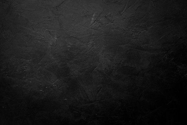 Sfondo di pietra nera Superficie nera Vista dall'alto Spazio libero per il testo