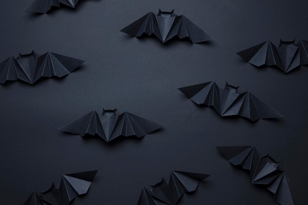 Sfondo di pipistrelli dracula spettrale di Halloween a base di origami