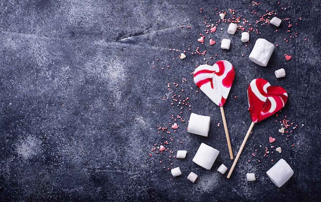 Sfondo di San Valentino con cuori e dolci