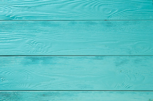 Sfondo di tavole di legno dipinte di azzurro e turchese