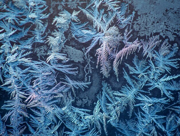 Sfondo fatto di vetri per finestre congelati in inverno