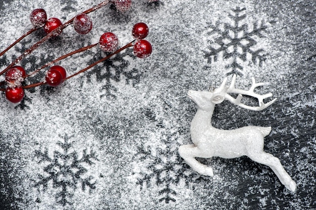 Sfondo festivo di Natale romantico con i cervi