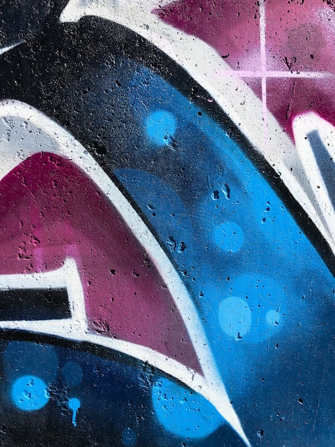 sfondo graffiti arte di strada astratta linee colorate e luminose di disegno sul muro