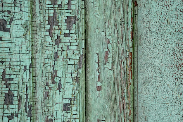 Sfondo in legno antico colore verde Sfondo texture in legno Facciata di una casa in legno