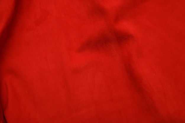 Sfondo in pelle rossa con superficie ruvida questa foto da vicino forma sgabello