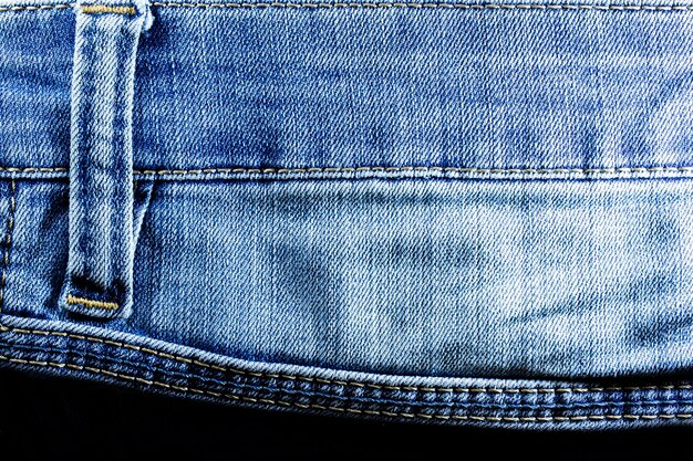 Sfondo jeans Concetto per abiti pubblicitari Il tessuto più popolare Primo piano La trama del tessuto