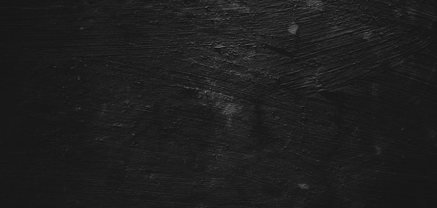 Sfondo nero del tratto di pennello naturale cemento testurizzato o pietra oldHorror Cement Texture Grunge sfondo spaventoso Muro di cemento Vecchio nero