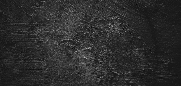 Sfondo nero del tratto di pennello naturale cemento testurizzato o pietra oldHorror Cement Texture Grunge sfondo spaventoso Muro di cemento Vecchio nero